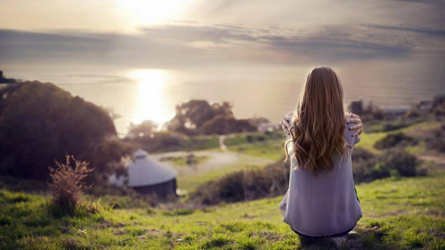 A Girl Looks At The Sunset
