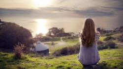 A Girl Looks At The Sunset