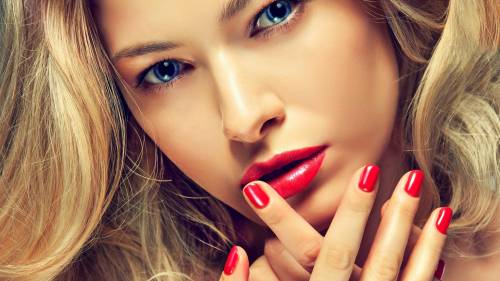 Blonde With Matching Manicure And Lipstick