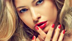 Blonde With Matching Manicure And Lipstick